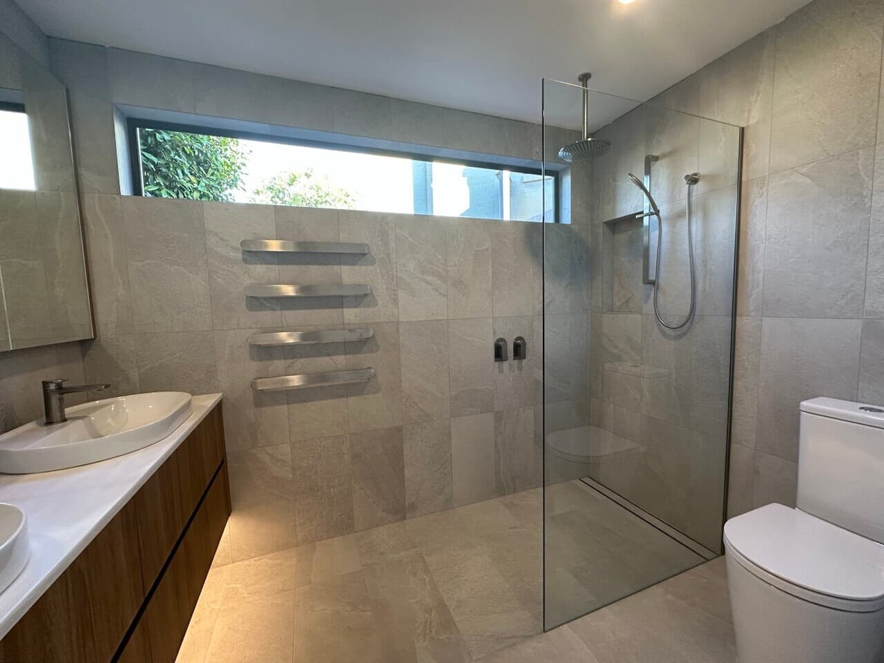 Modern bathroom renovation in Canberra, Australia with sleek design and spacious layout.